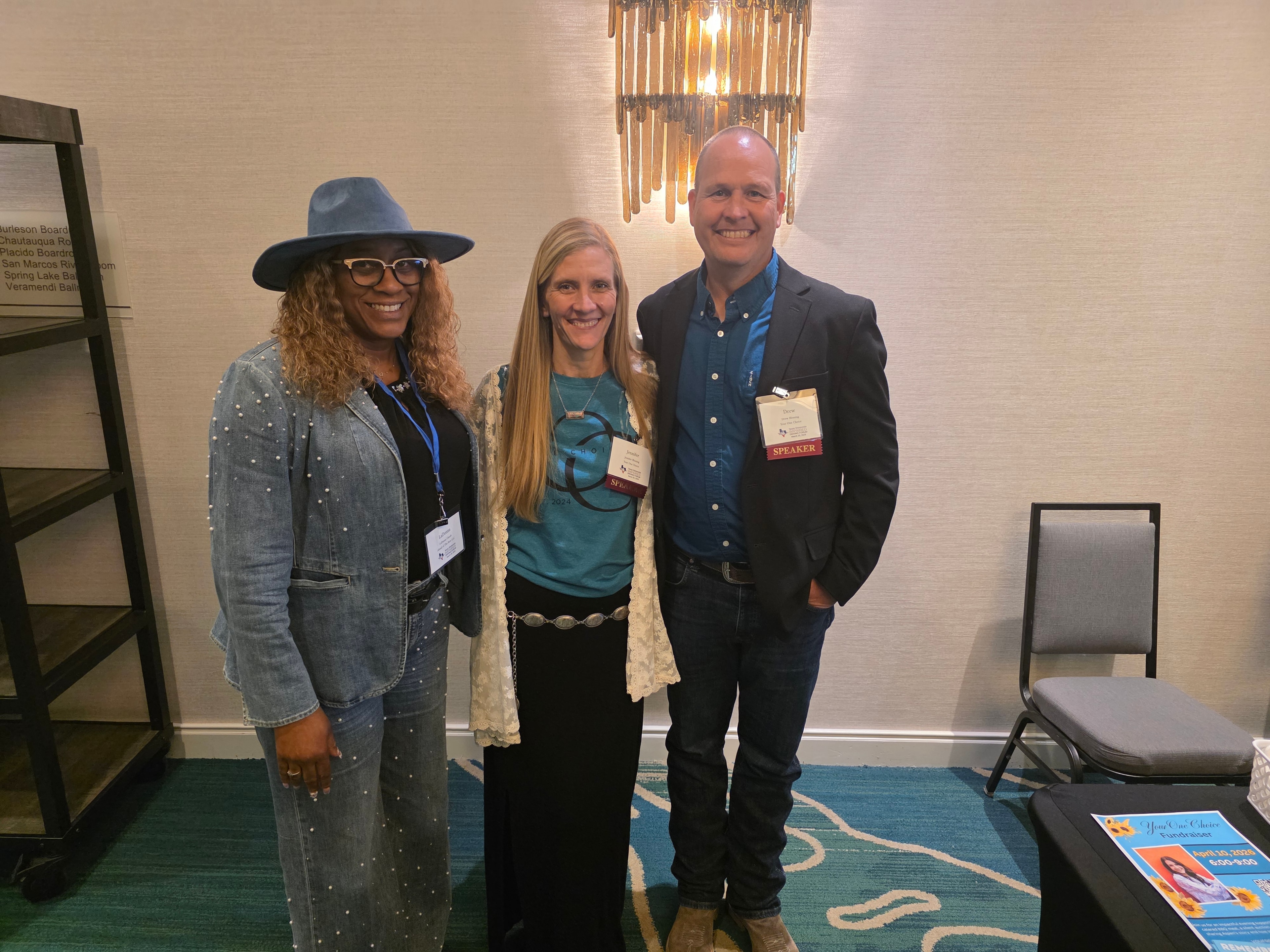 LaDonna Claude with fellow speakers at conference event