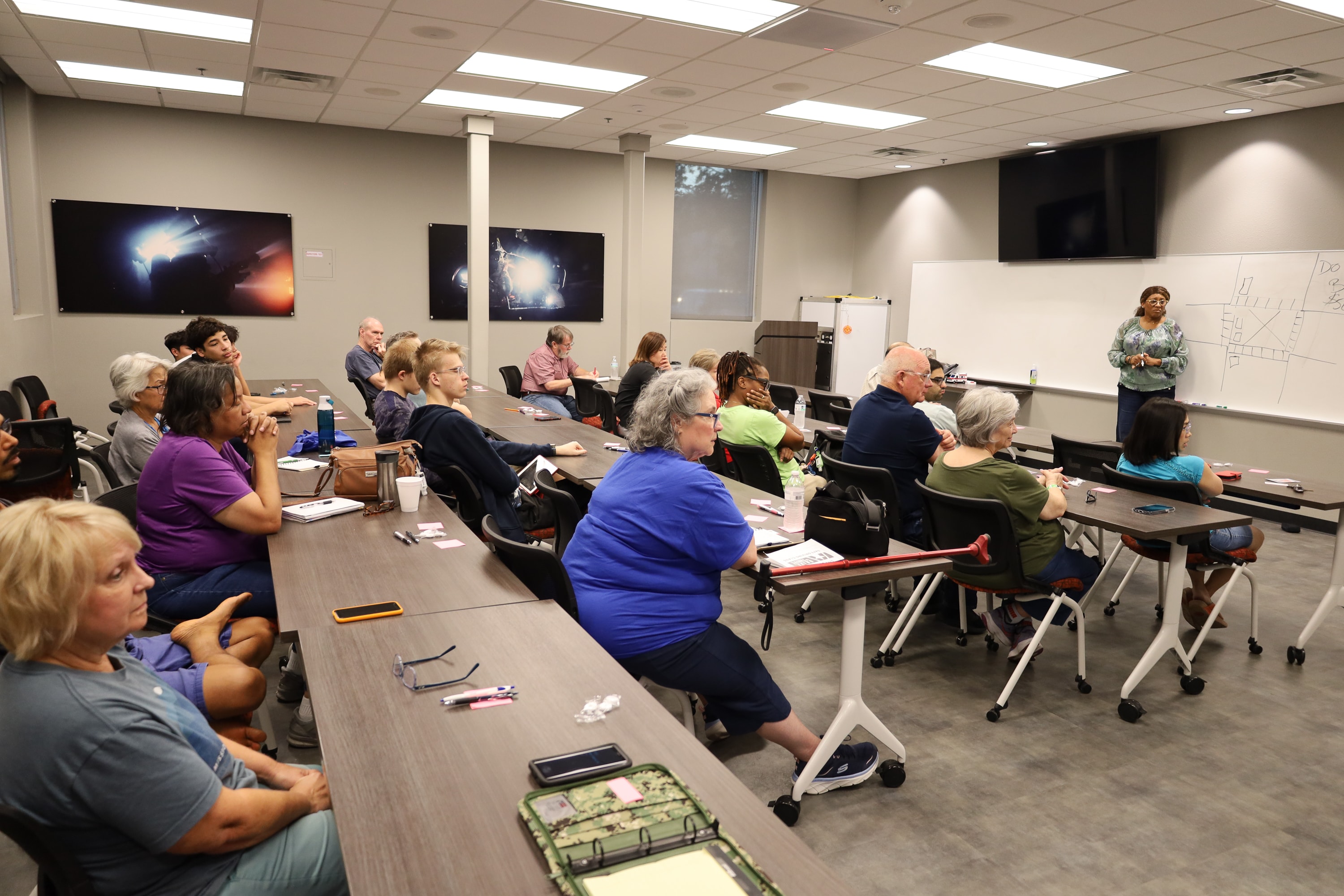 Full classroom of adults attending LaDonna Claude safe driving course