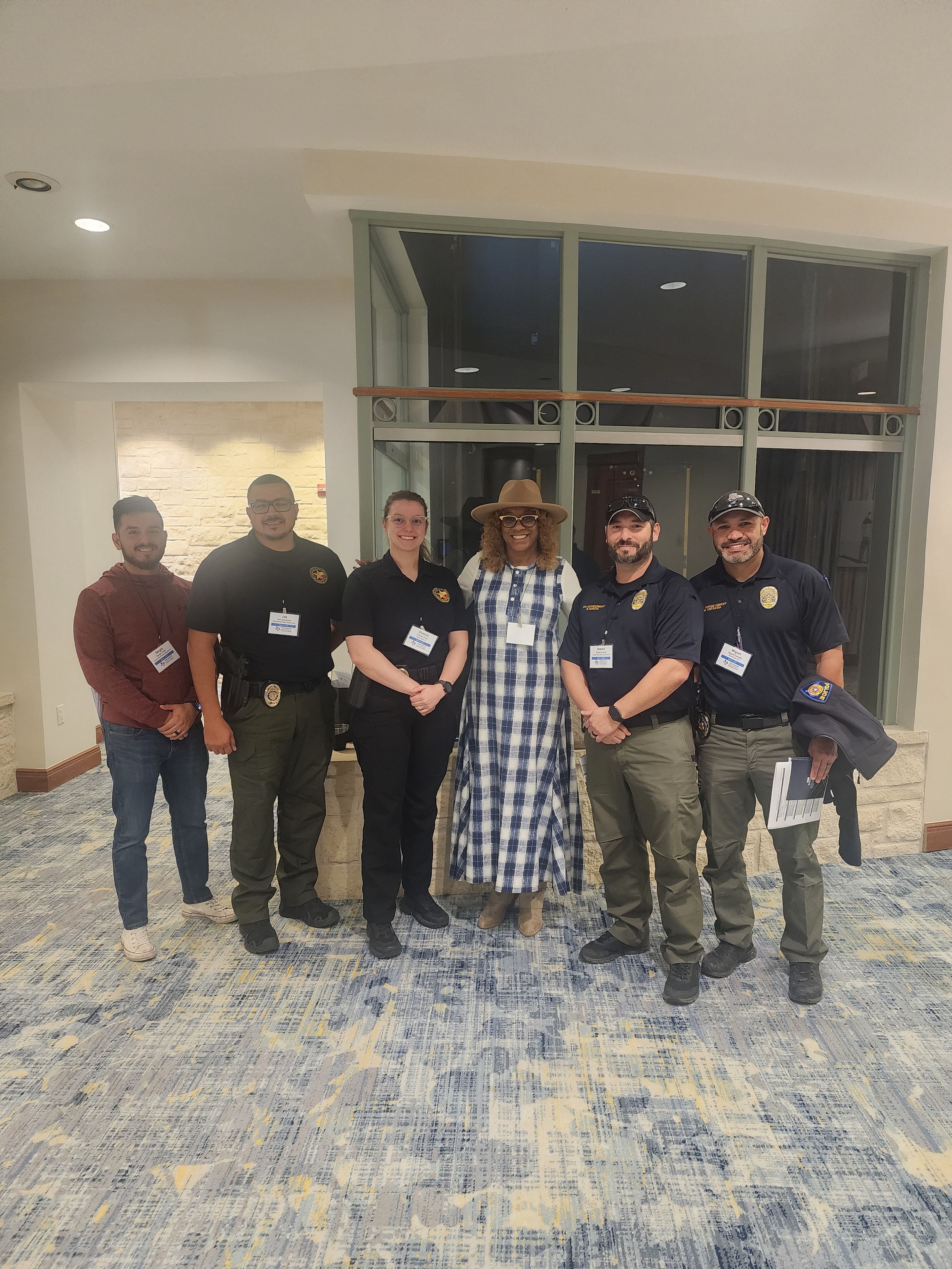 LaDonna Claude with police officers at event